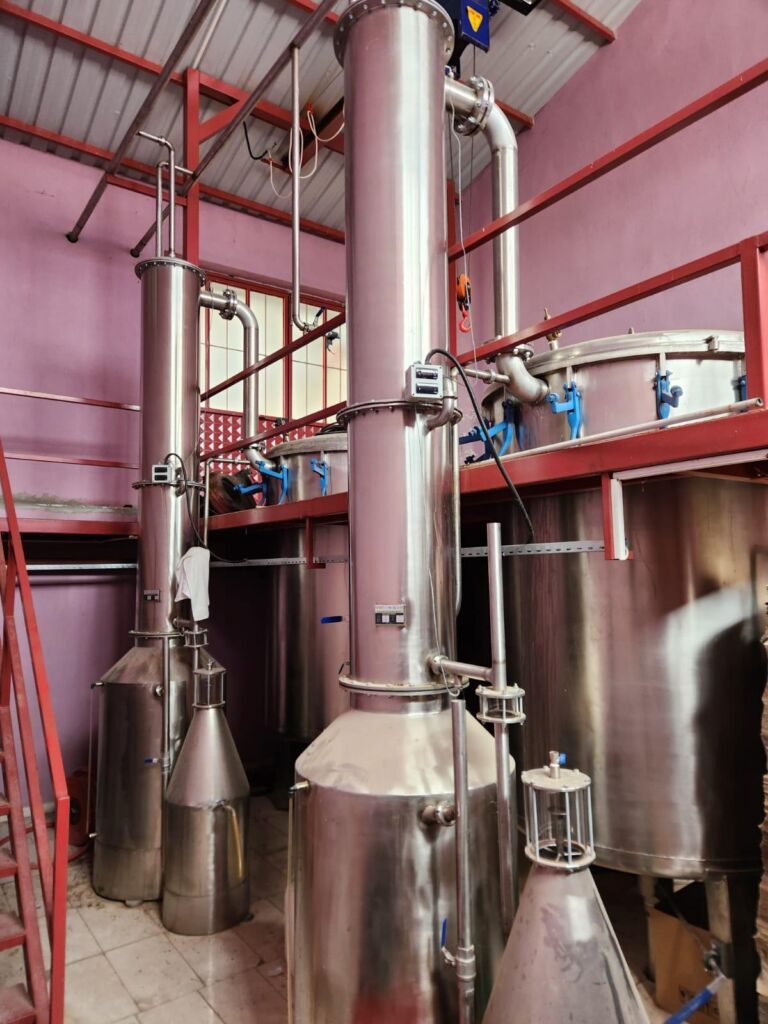 Stainless steel steam distillation system inside TheRosa’s rose oil production area